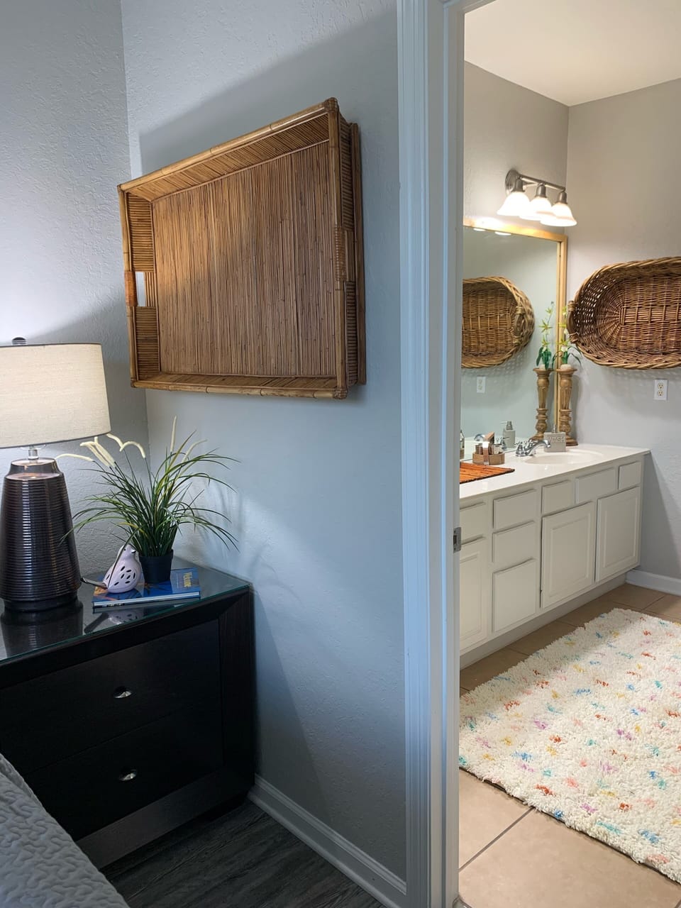 Right side of the master bedroom and view of the en suite bathroom.