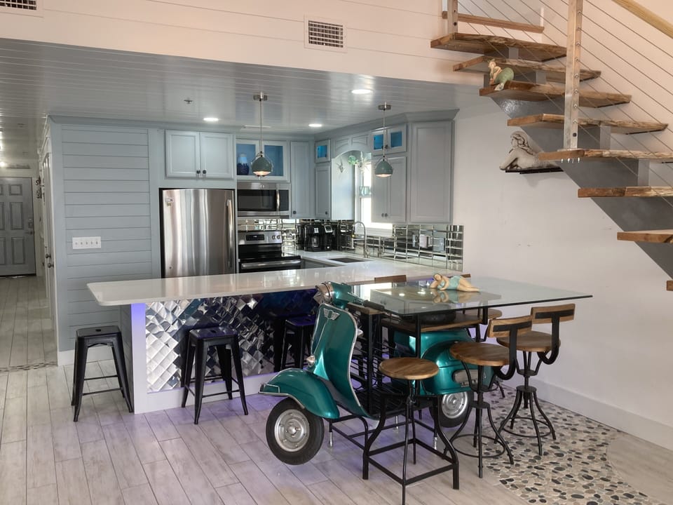 WELCOME TO “GIRLS GIRLS GIRLS”, a one-of-a-kind “beachy-retro” beachfront condo😎