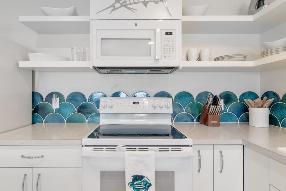 White cottage kitchen with open shelving