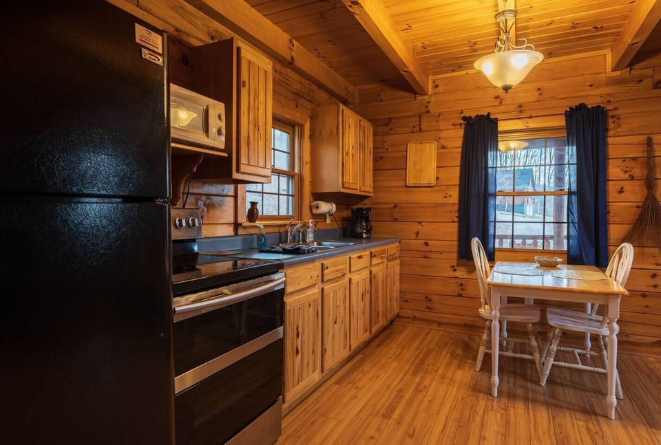 This kitchen comes with a stove, microwave, refrigerator, coffee maker, and toaster, along with all the necessary culinary tools to delight your taste buds.