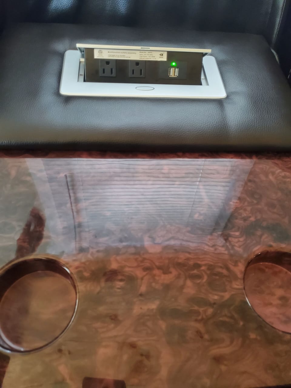 charging station on each end as in the middle of couch