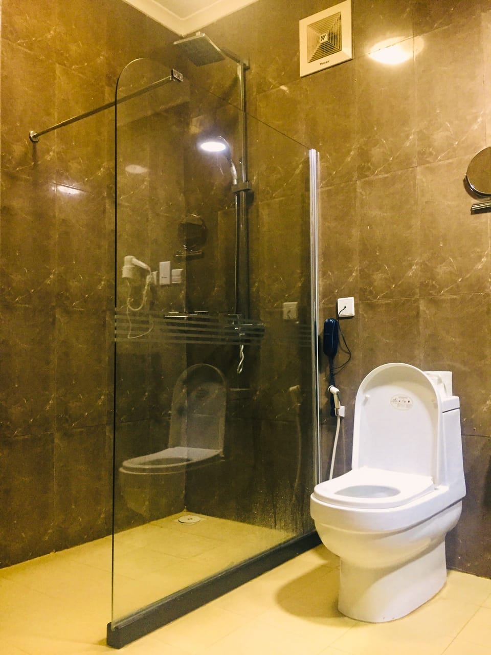 Shower, rainfall showerhead, designer toiletries, hair dryer