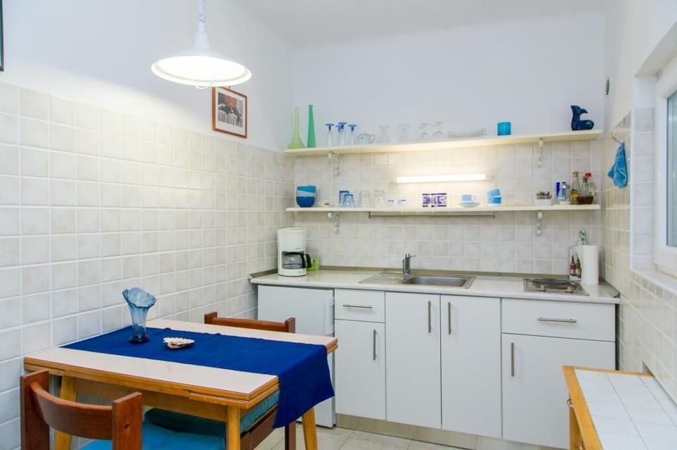 Apartment (One Bedroom Apartment with Two Terrac) | Private kitchen | Fridge, microwave, stovetop, coffee/tea maker
