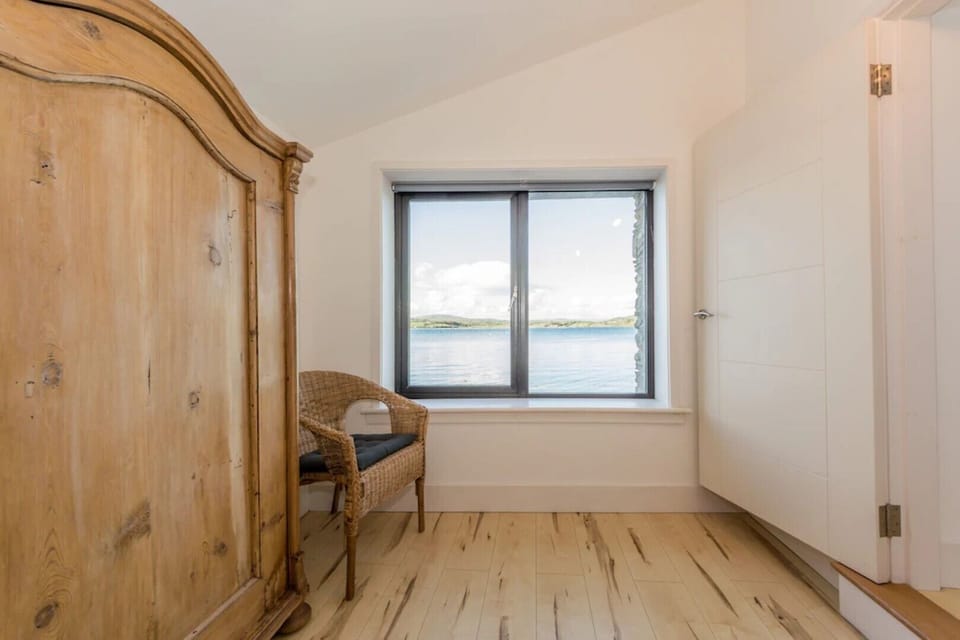 Mulroe Boathouse double bedroom with seaview
