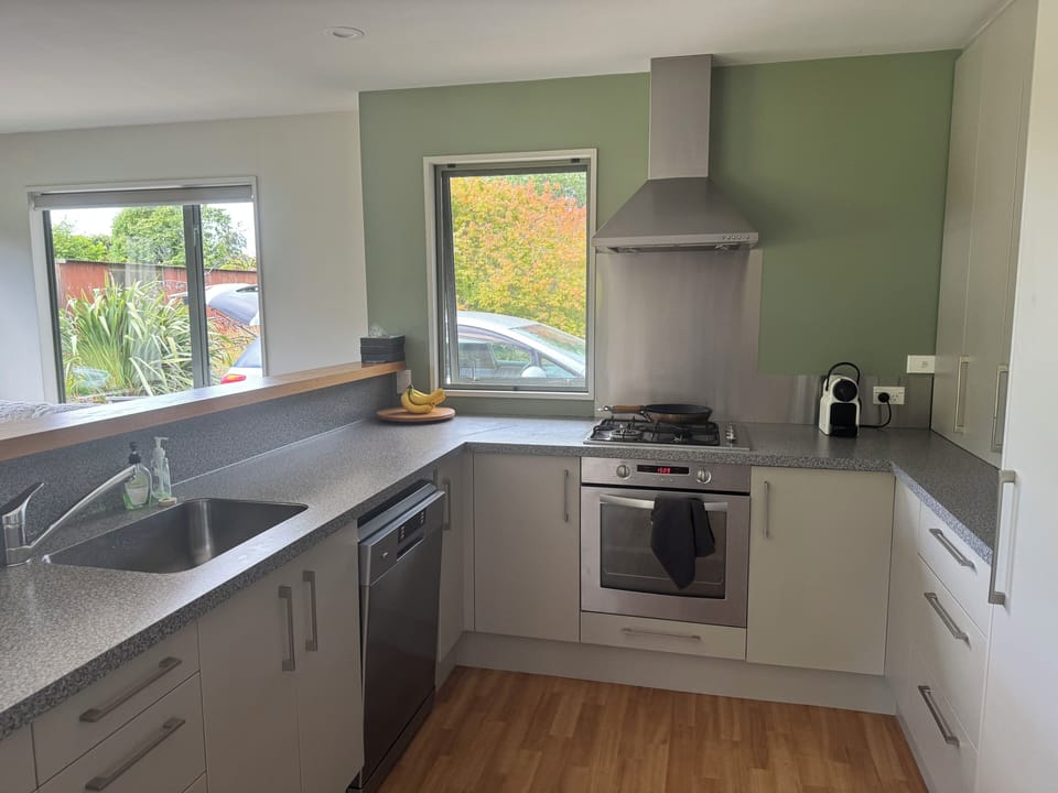 Modern kitchen with all the mod con appliances, including Nespresso machine