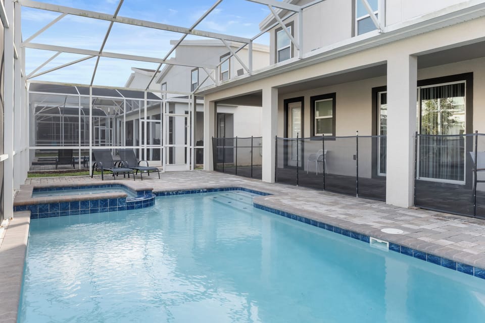 Your private pool oasis awaits with crystal-clear waters, covered lounging area, and safety features for peace of mind.