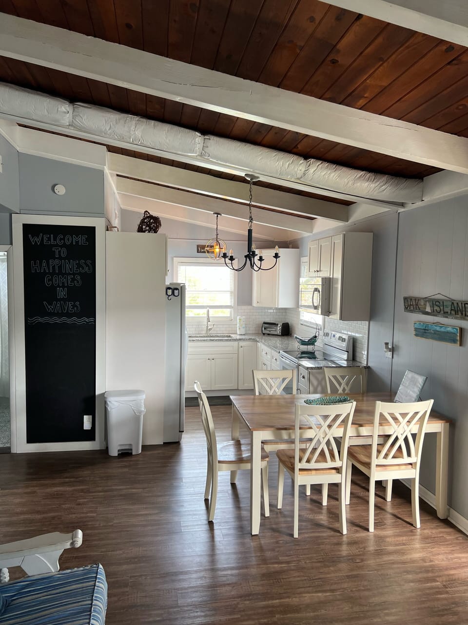 Kitchen with table, all open to living room. 