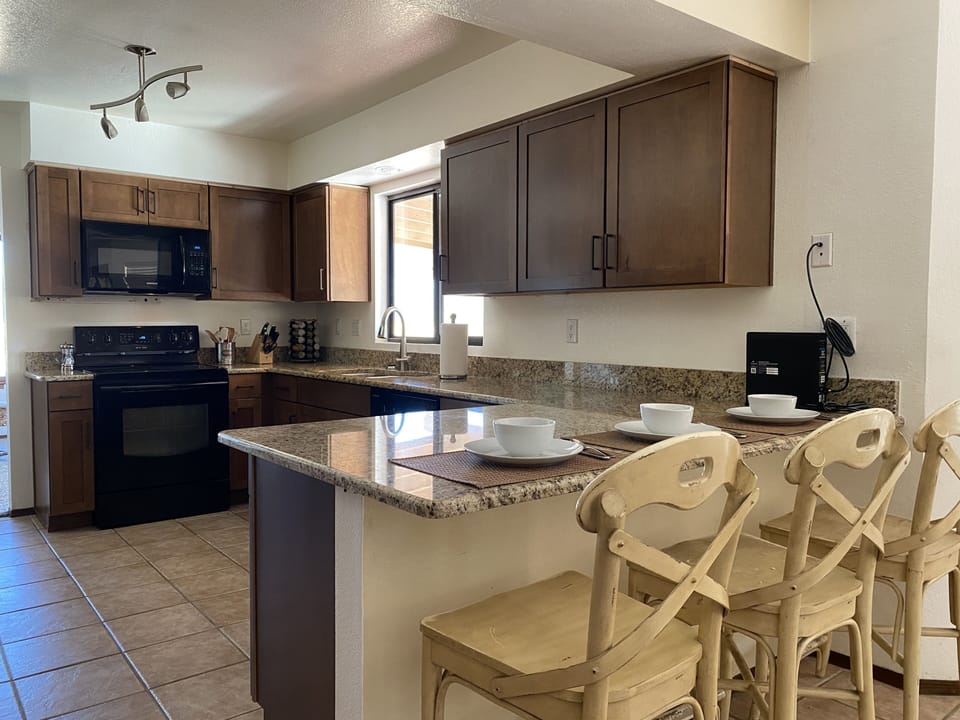 Kitchen with new cabinets, granite countertops, and plenty of room.