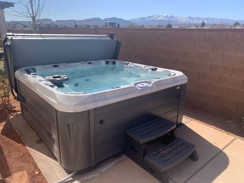 Private hot tub on the patio is the perfect place to end the evening