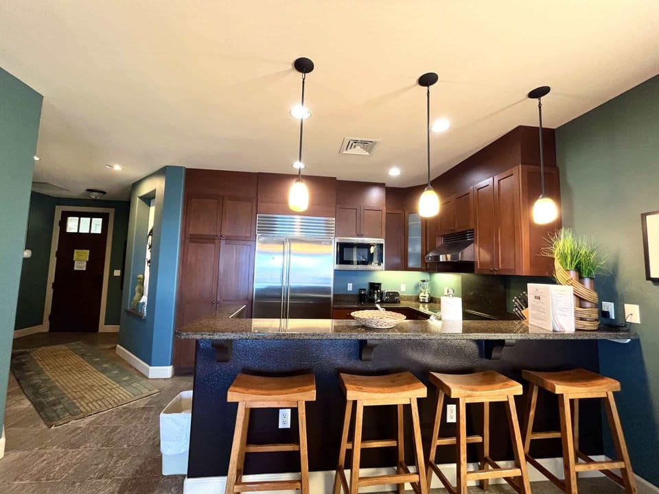 Condo, Multiple Beds, Lanai, Ocean View (Hali'i Kai 15A) | Private kitchen | Fridge, microwave, oven, stovetop