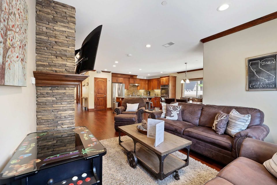 Townhome, Multiple Beds, Balcony, Mountain View (Tahoe Woods Villa) | Living area | 65-inch flat-screen TV with digital channels, fireplace
