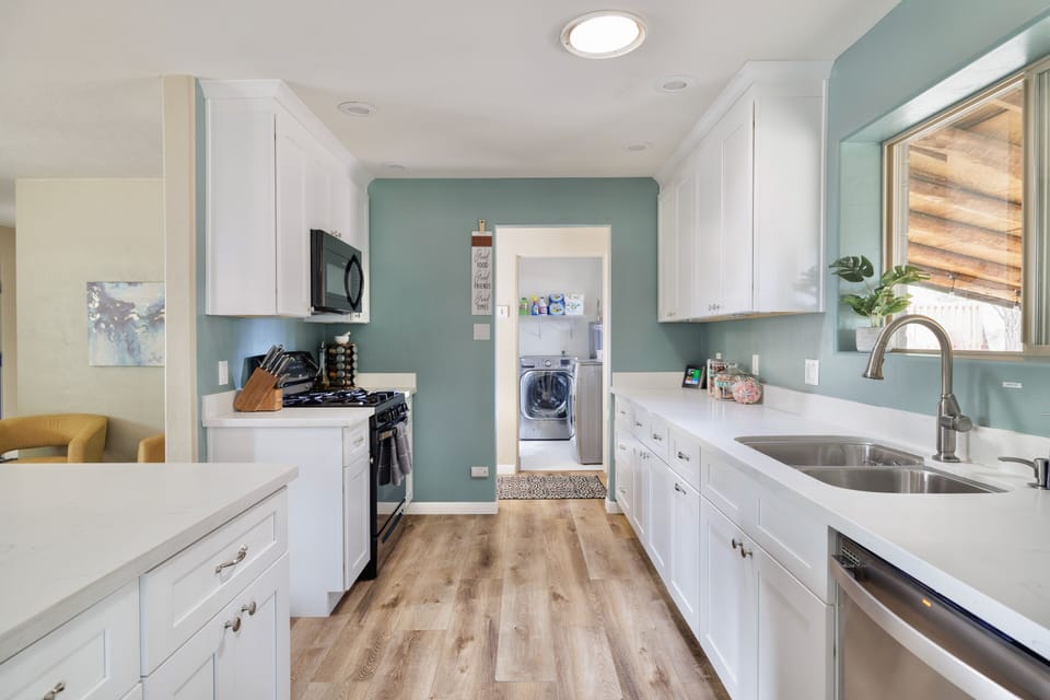 Open kitchen concept with quartz counter tops