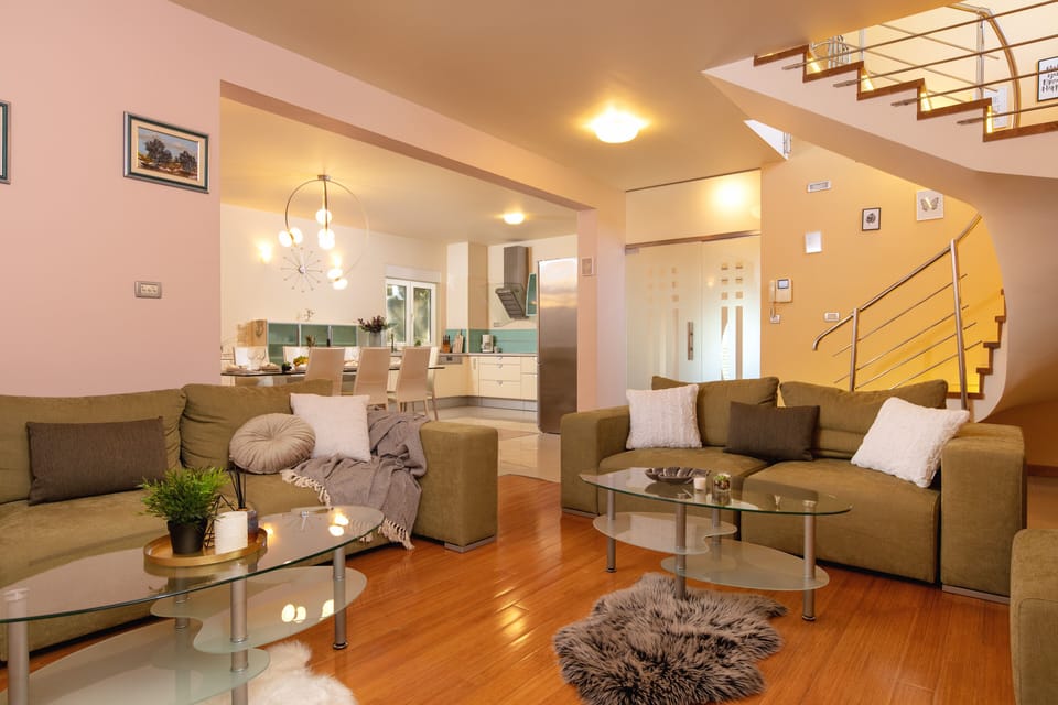 Luxury Villa | Living area | 100-cm plasma TV with satellite channels, TV, fireplace