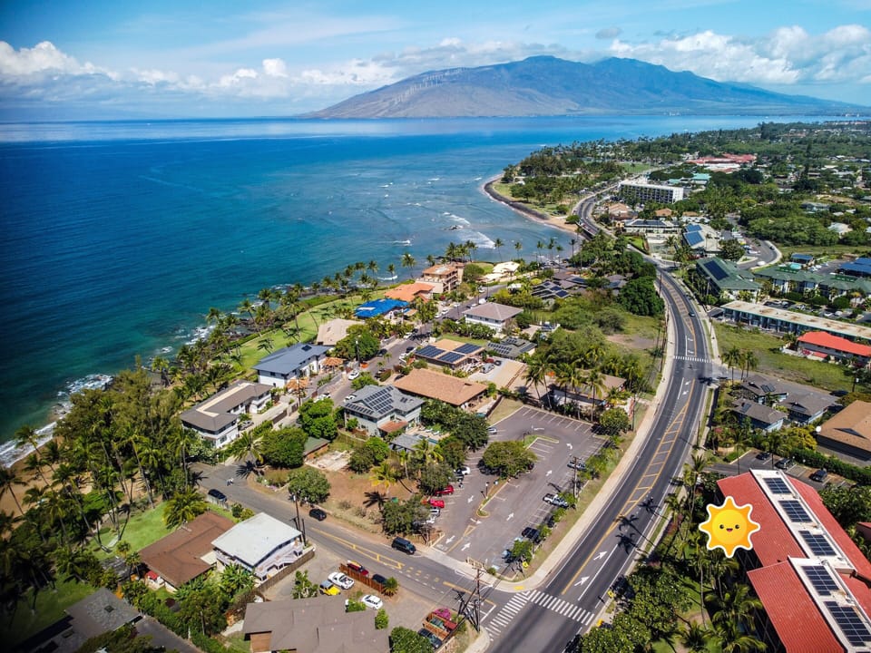 Heading north with the West Maui Mountains in the background
