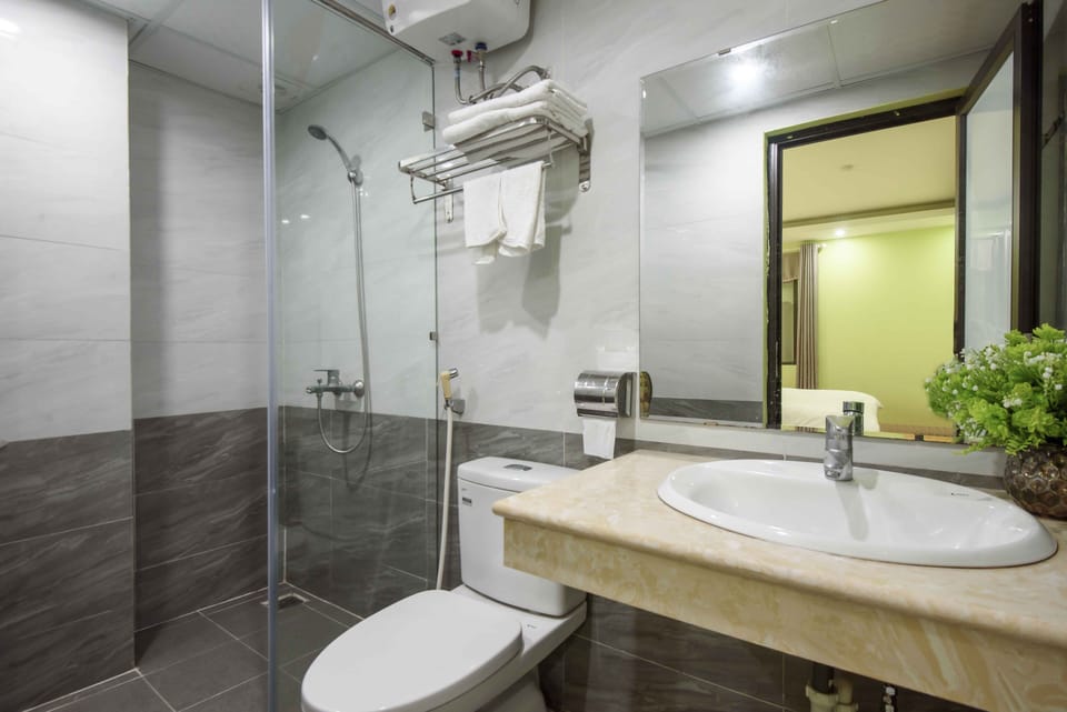 Shower, hydromassage showerhead, designer toiletries, hair dryer