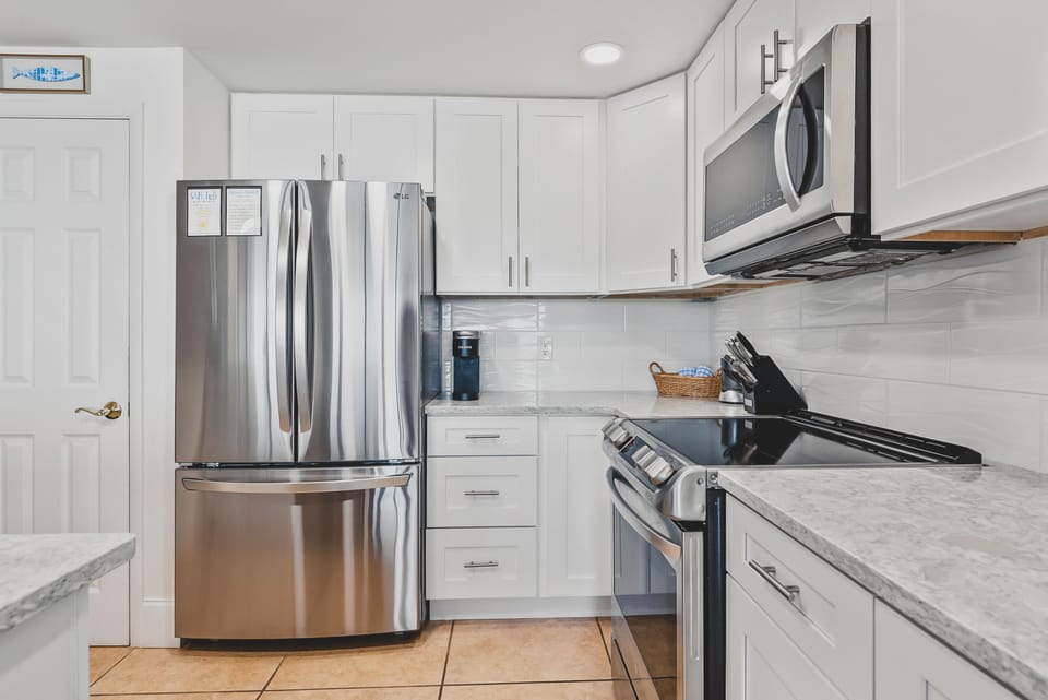 Fully equipped kitchen with stainless appliances