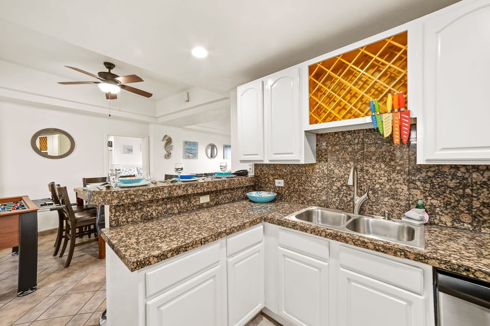 Flow easily from cooking to dining in this well-appointed kitchen-dining combo.