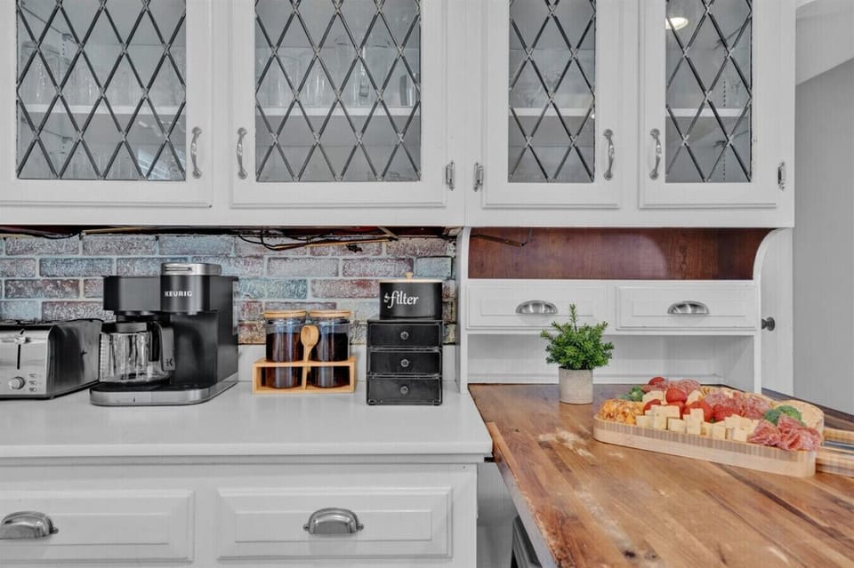 Start your mornings right at our cozy coffee corner! Featuring a Keurig with a variety of pods, it`s the perfect spot to brew your favorite cup and relax.