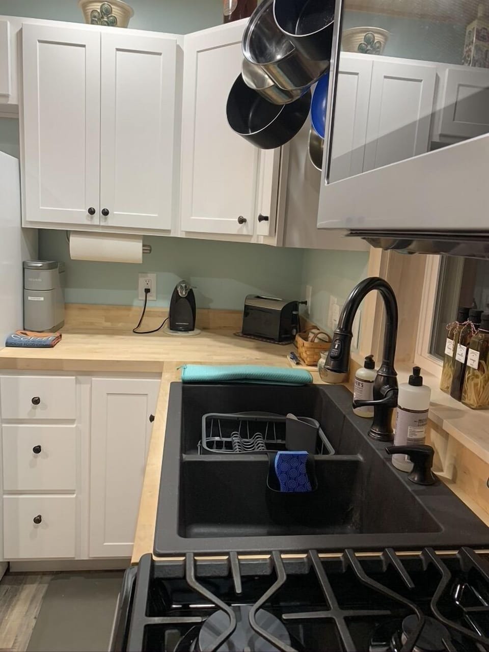 Kitchen with Kuerig, toaster, can opener, etc