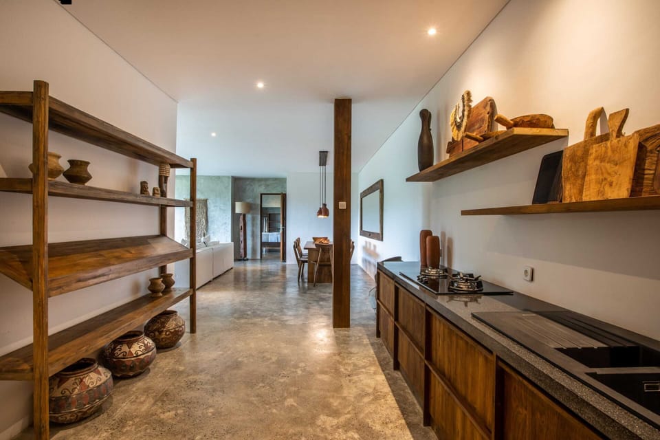 Apartment, 2 Bedrooms, Smoking, Pool Access | Private kitchen | Microwave, coffee/tea maker, cookware/dishes/utensils, paper towels