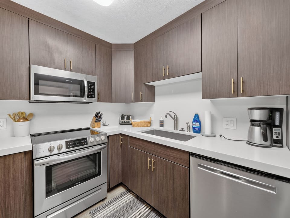 Your fully equipped kitchen invites you to whip up a quick breakfast or brew fresh morning coffee before heading out to explore. Modern appliances and sleek countertops make meal prep a breeze.