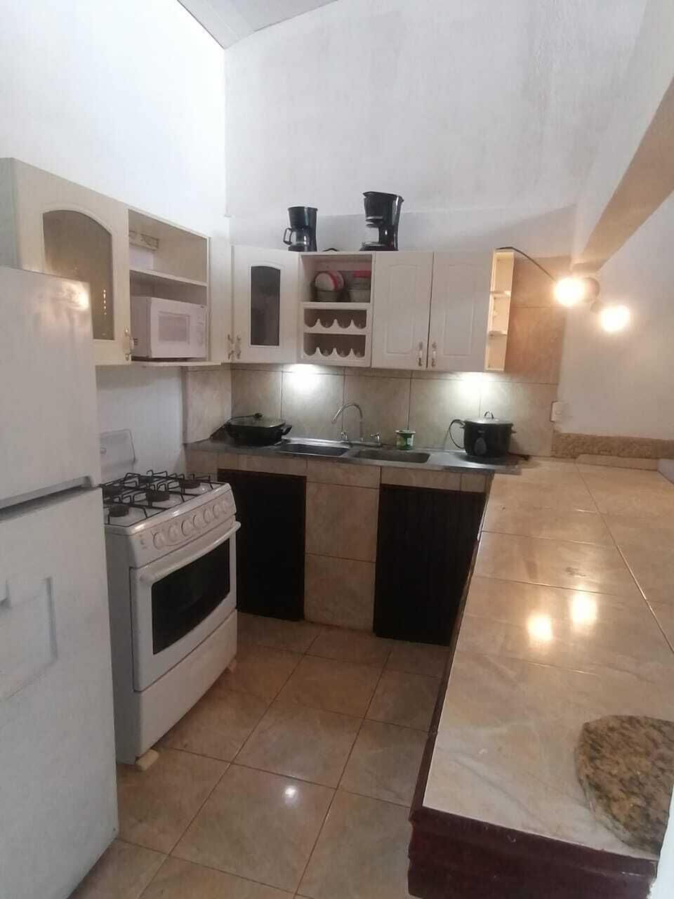 Family House | Private kitchen | Full-size fridge, microwave, oven, stovetop