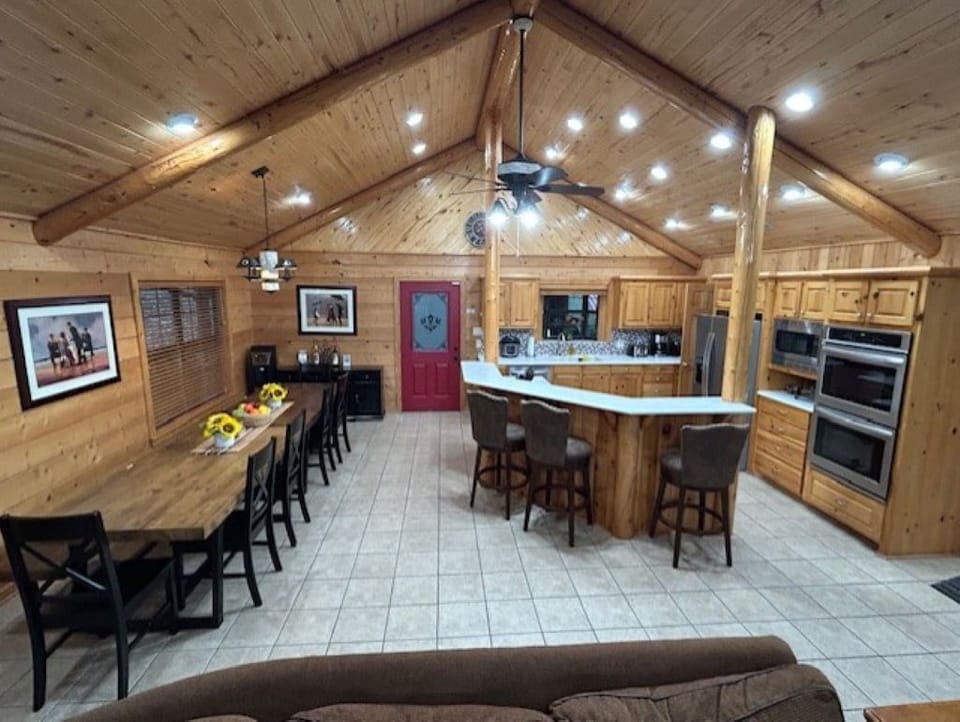 Open dining and kitchen area with eating bar and lots of counter space