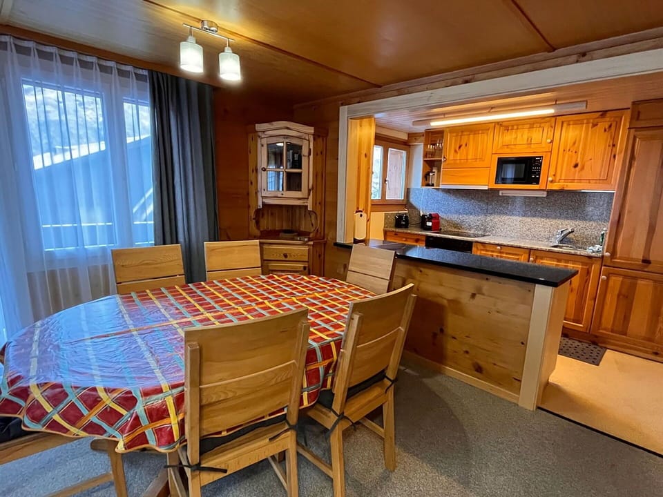 Table, Furniture, Chair, Cabinetry, Wood, Countertop, Interior Design, Floor, Kitchen, Flooring