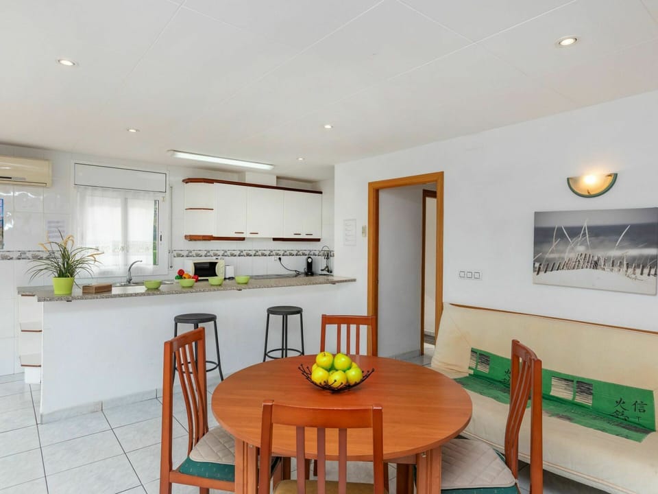 Table, Furniture, Countertop, Property, Cabinetry, Chair, Home Appliance, Wood, Orange, Kitchen