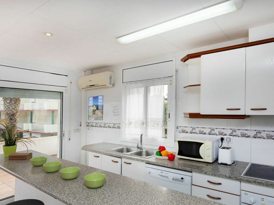 Cabinetry, Tap, Sink, Countertop, Property, Kitchen Sink, Plant, Building, Plumbing Fixture, Window