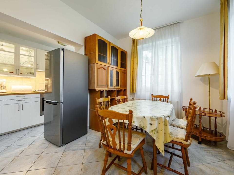 Furniture, Cabinetry, Table, Property, Countertop, Chair, Kitchen Appliance, Wood, Lighting, Kitchen Stove