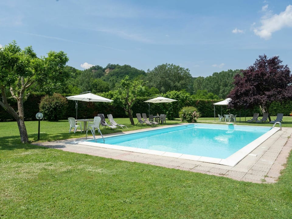 Plant, Water, Sky, Swimming Pool, Cloud, Tree, Shade, Rectangle, Umbrella, Outdoor Furniture