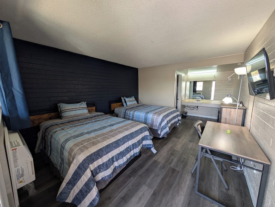 Desk, blackout drapes, iron/ironing board (on request), WiFi (free)