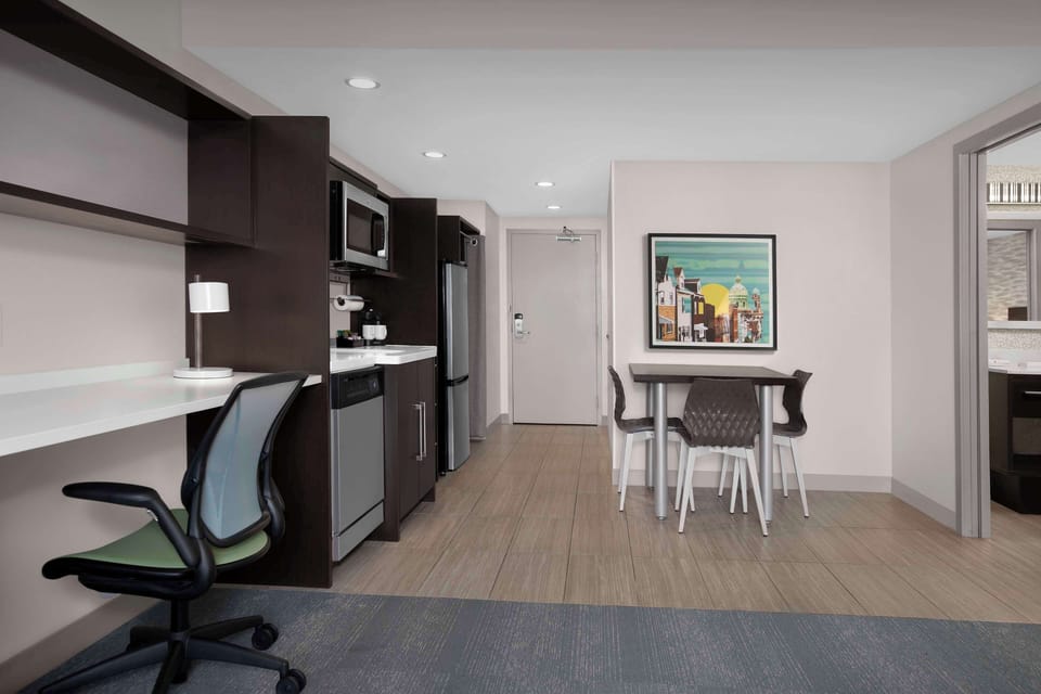 One Bedroom Suite, One King Bed, Non-Smoking | Living area | 42-inch LCD TV with cable channels, TV