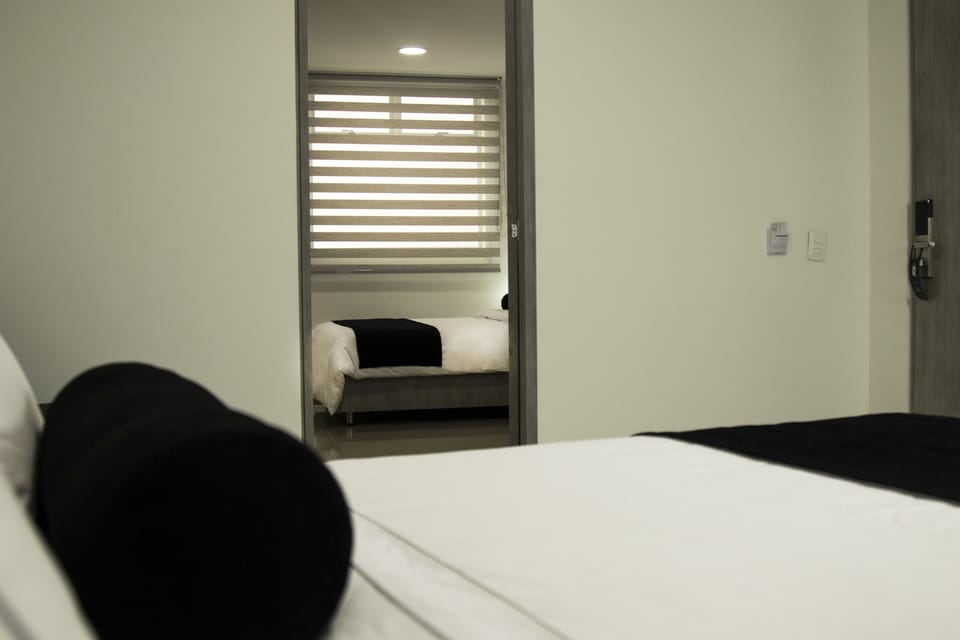 Family Room | In-room safe, desk, laptop workspace, blackout drapes