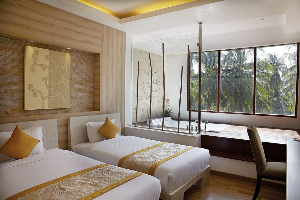 Junior Double or Twin Room | Minibar, in-room safe, desk, free WiFi