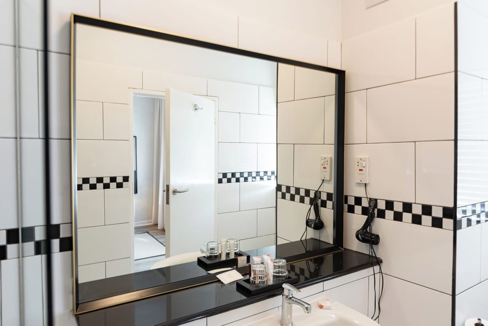 Eco-friendly toiletries, hair dryer, towels
