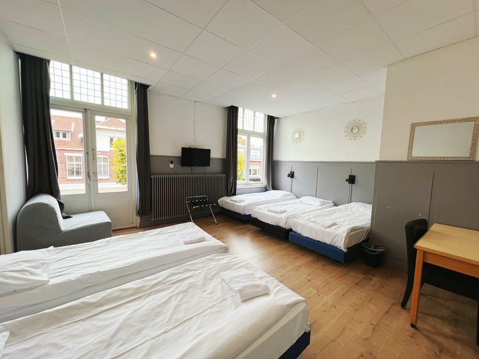 Desk, free WiFi, bed sheets