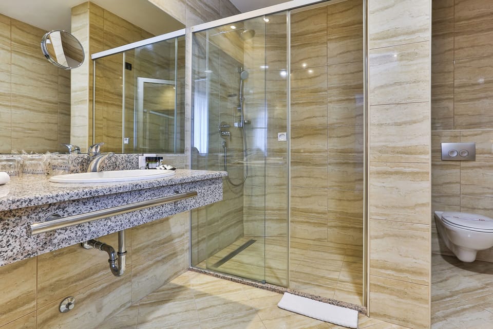 Shower, free toiletries, hair dryer, bathrobes