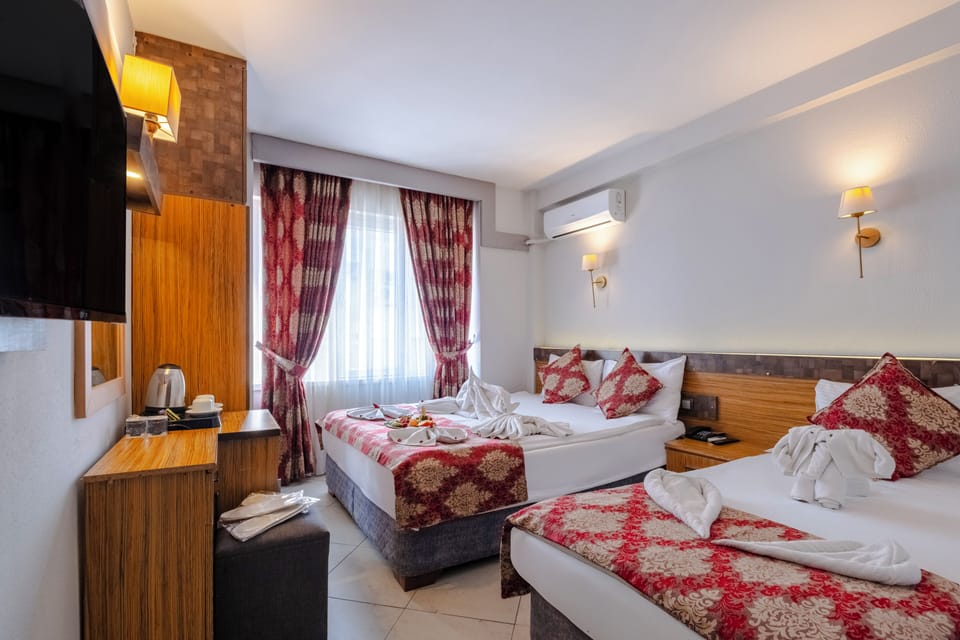 Standard Double or Twin Room | Minibar, in-room safe, free WiFi, bed sheets
