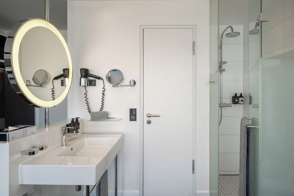 Eco-friendly toiletries, hair dryer, towels, soap