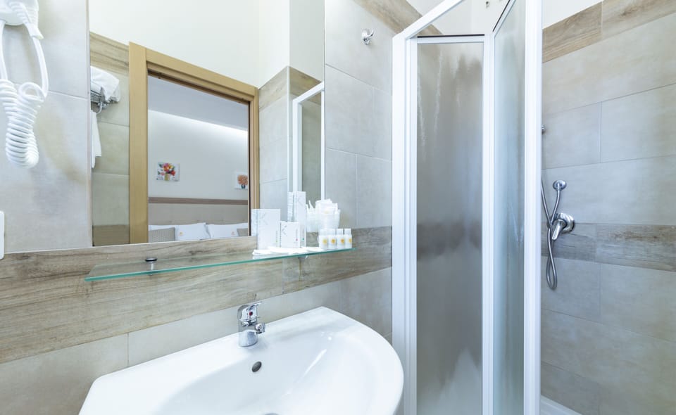 Quadruple Room | Bathroom | Bidet, towels