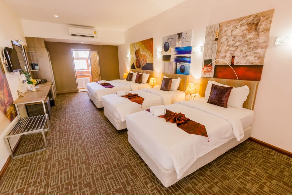 Standard Triple Room | Minibar, in-room safe, desk, rollaway beds