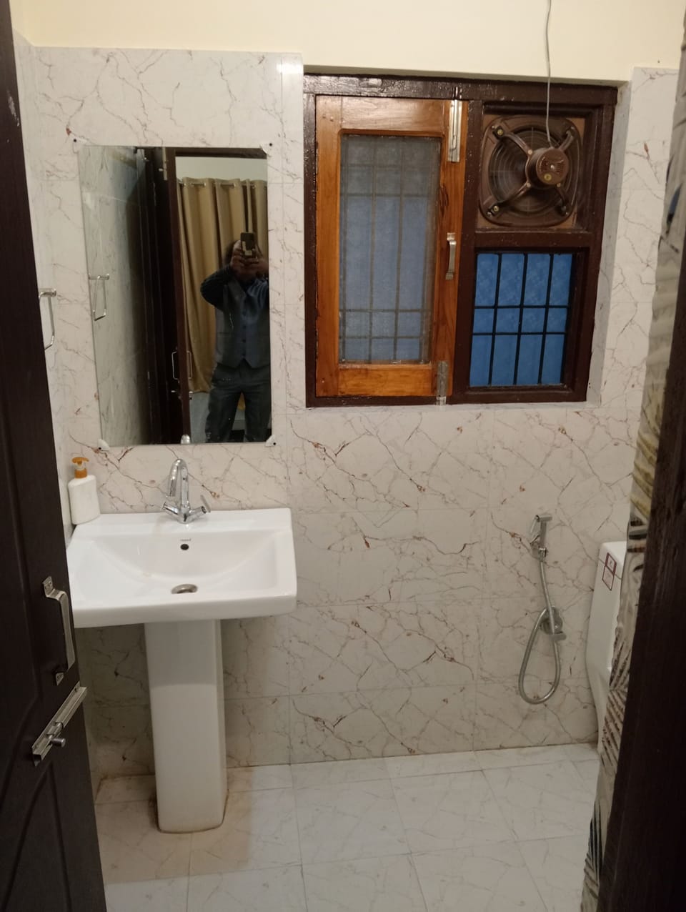 Shower, designer toiletries, hair dryer, slippers