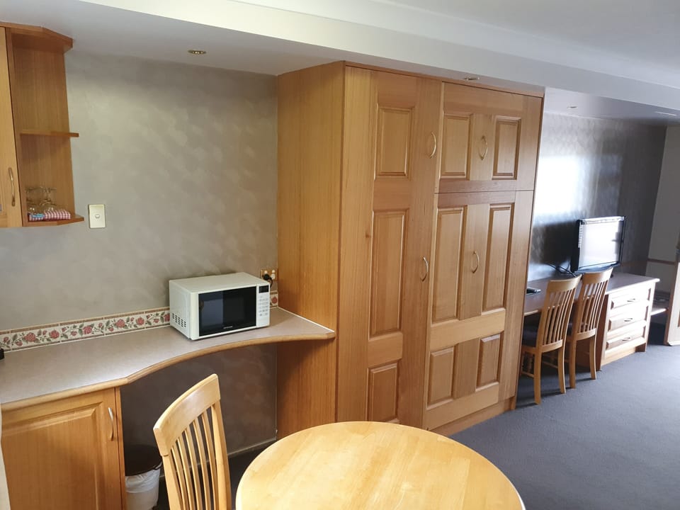 Small Family Room | Minibar, in-room safe, iron/ironing board, WiFi (free)
