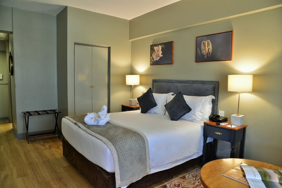Deluxe Room, 1 Double Bed, City View | 1 bedroom, in-room safe, desk, free WiFi