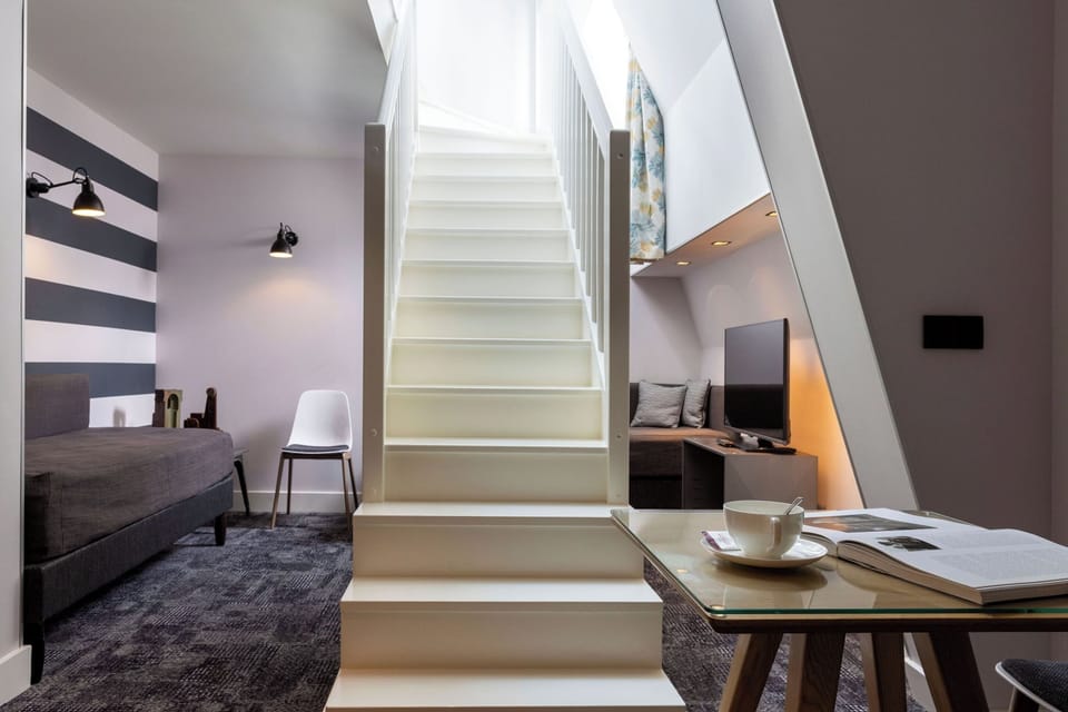 Duplex Room | Premium bedding, minibar, in-room safe, individually decorated