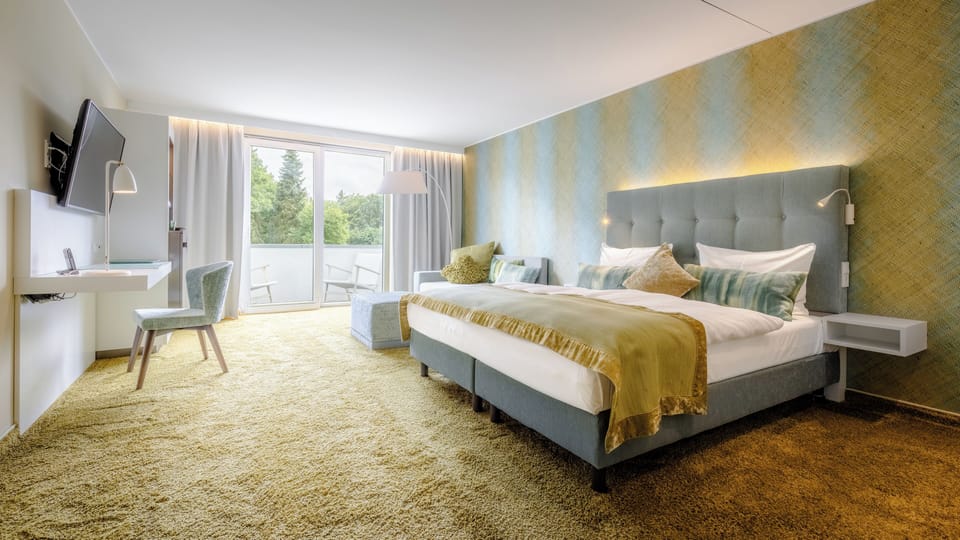 Hypo-allergenic bedding, free minibar, in-room safe, desk