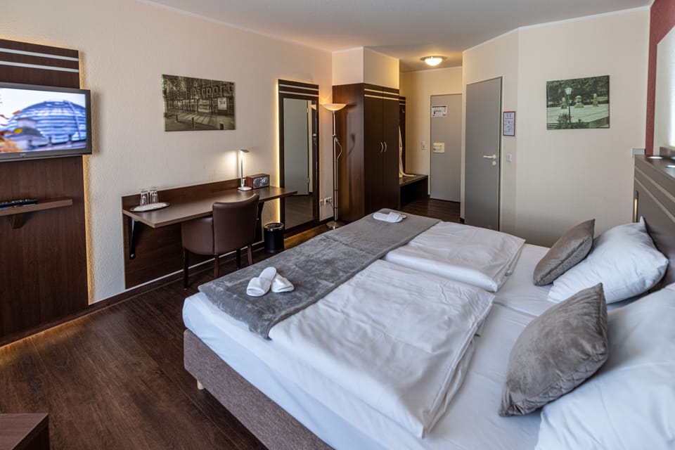 Desk, laptop workspace, blackout drapes, soundproofing