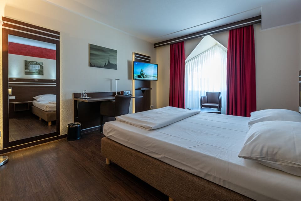 Desk, laptop workspace, blackout drapes, soundproofing